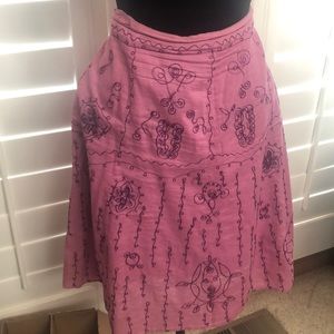 Embroidered detailed mauve colored cotton skirt.